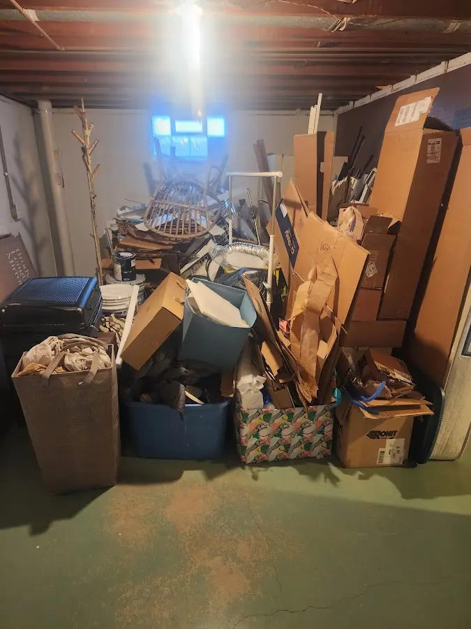 Roll-off dumpster container at job site for 15 Yard Dumpster Rental in Windham